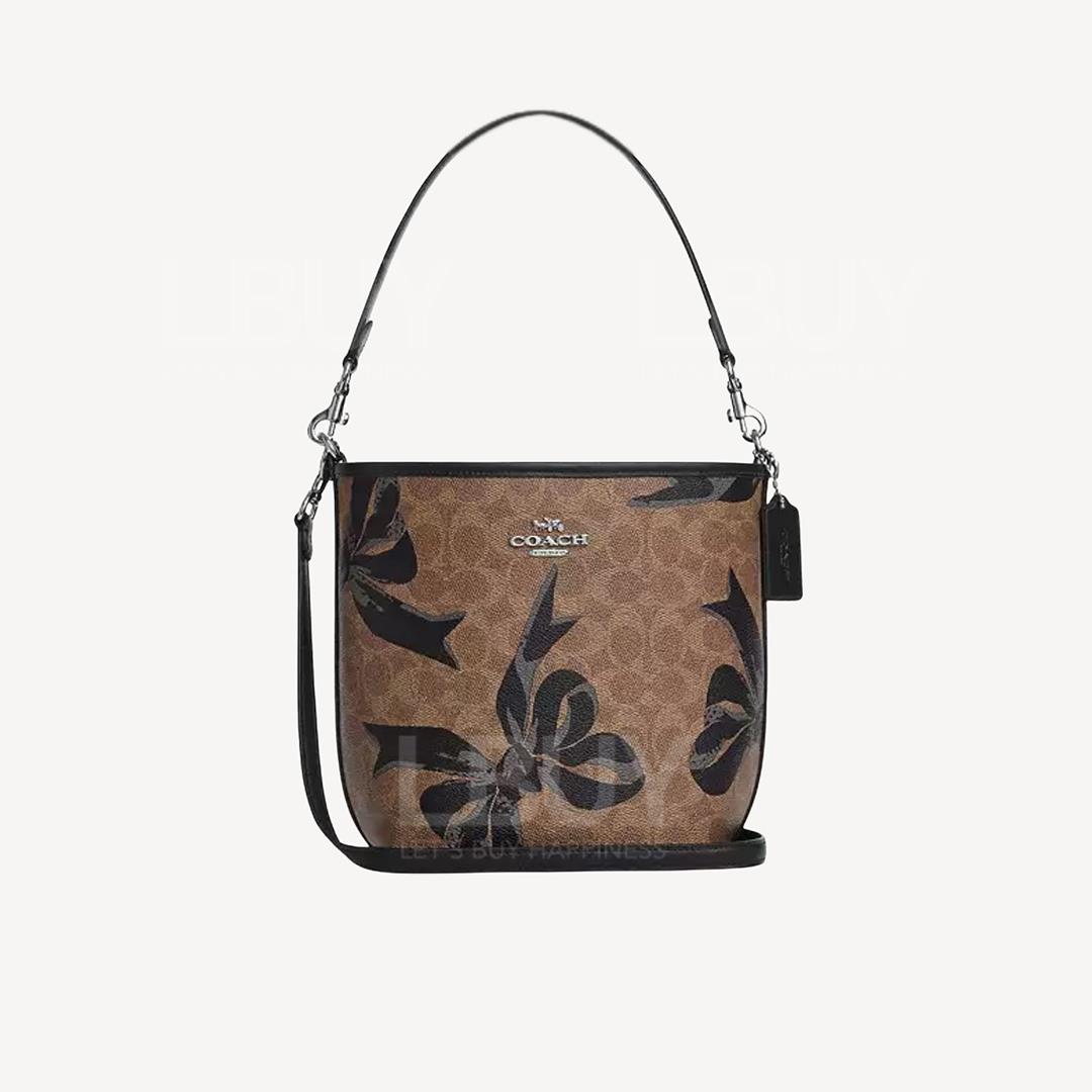 City Bucket Bag In Signature Canvas With Bow