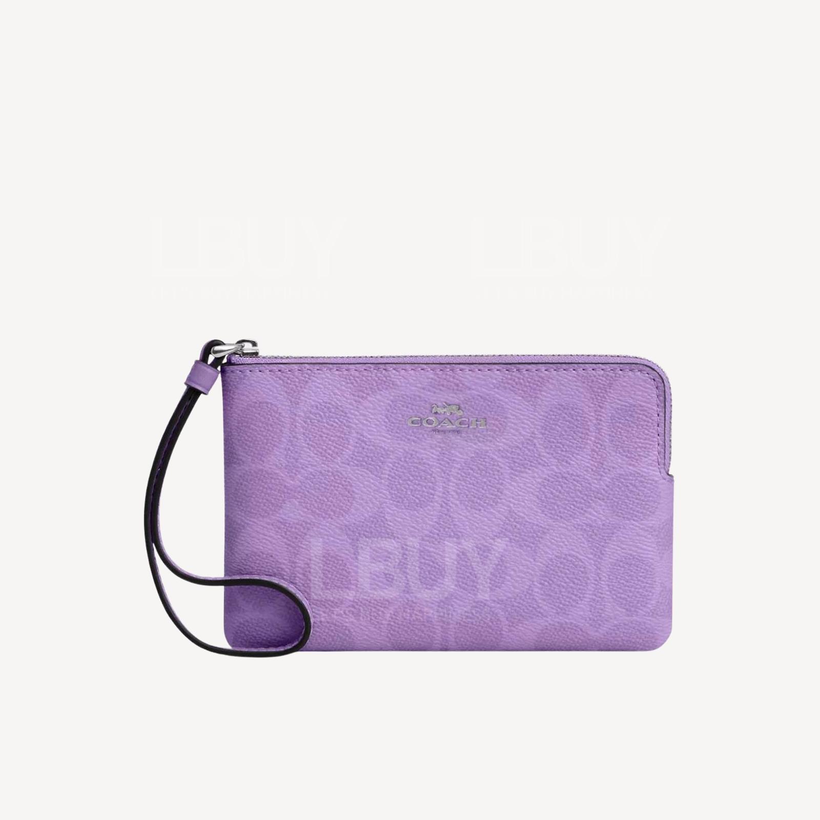 Coach Corner Zip Wristlet In Signature Canvas